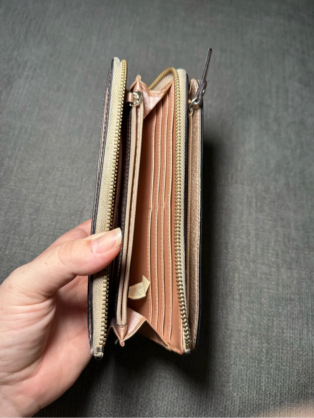 Kate spade Metallic Rose Gold Wristlet Wallet with Zip Closure